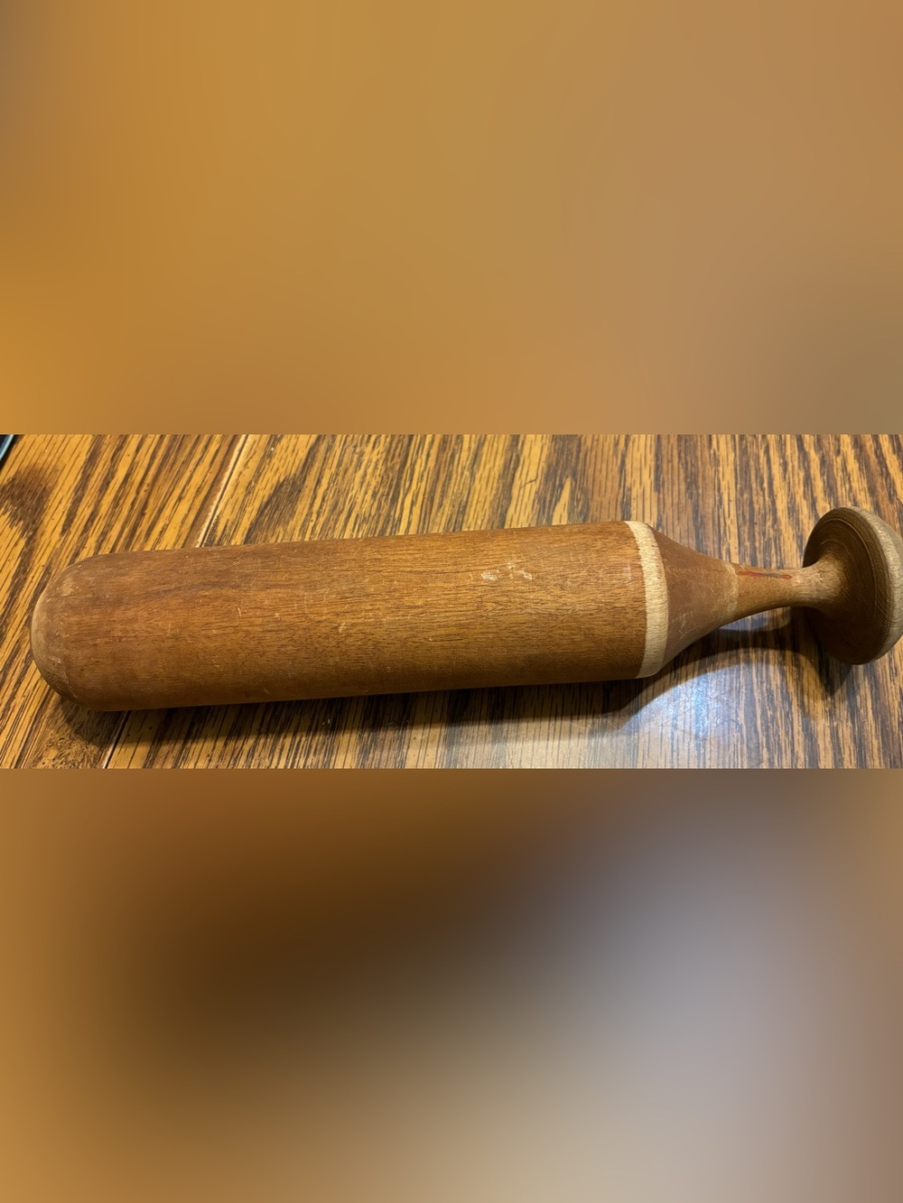 wooden sock darner (also called a sock mender).